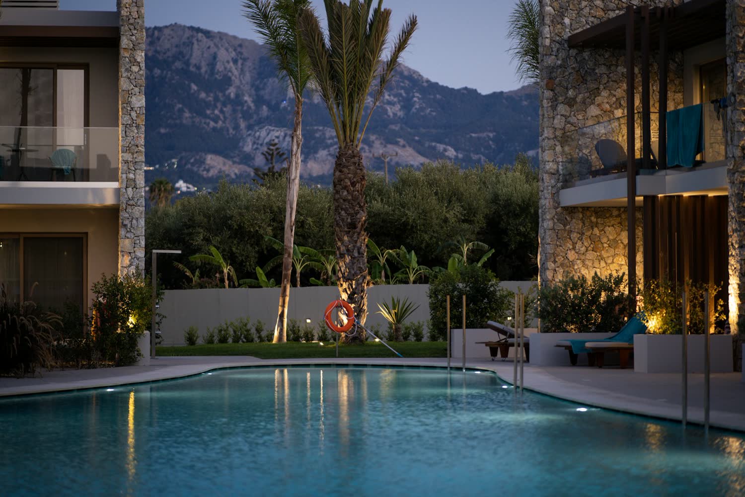 The pool terrace at dusk