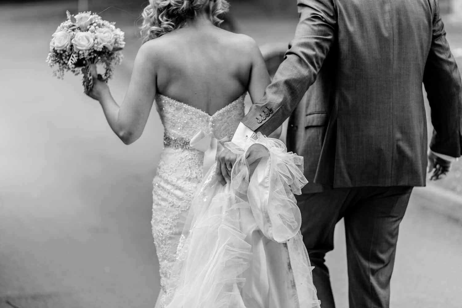 Bride walking arm in arm before the ceremony